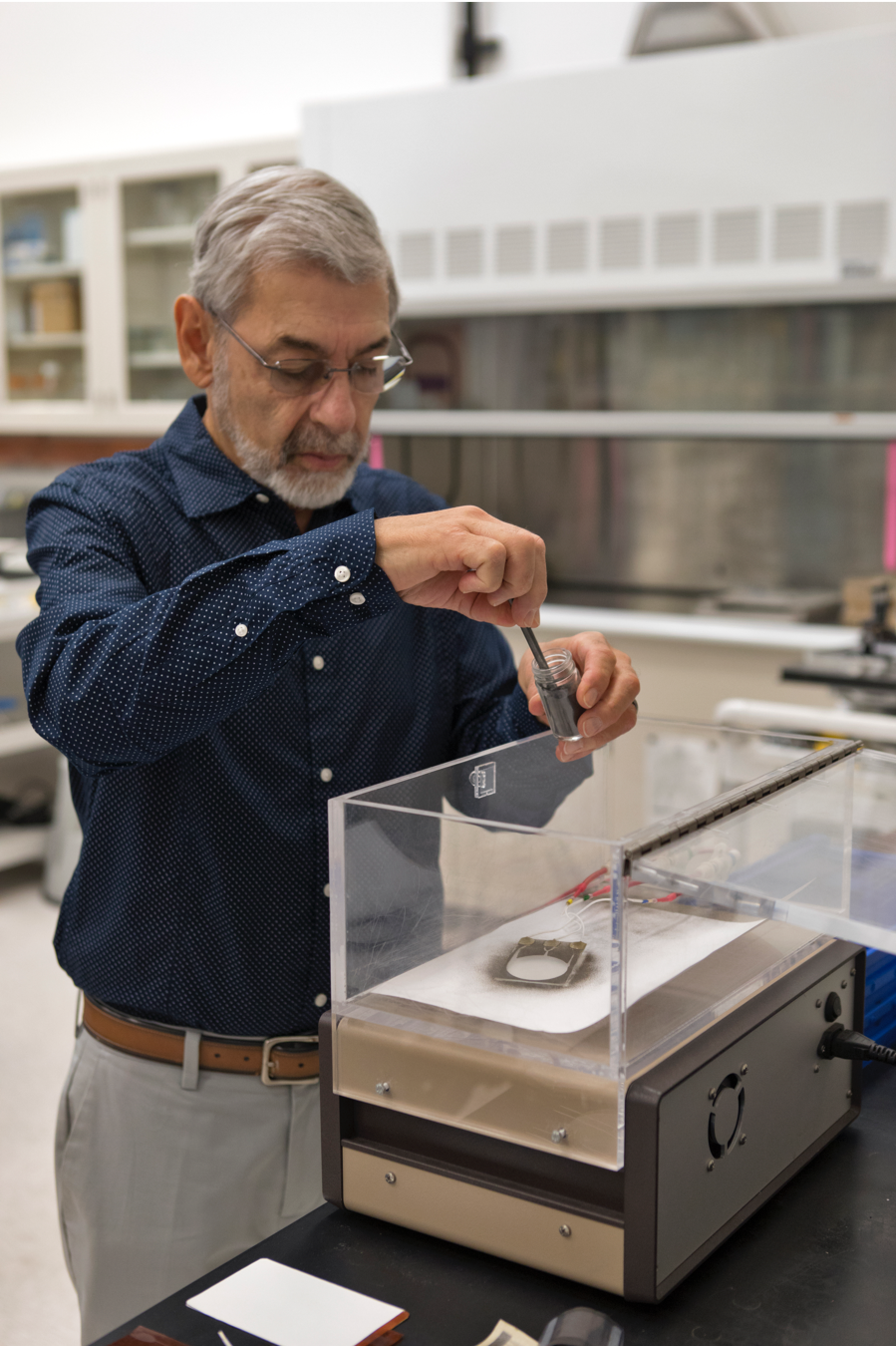 Inventor Carlos Calle working on his technology at NASAs Kennedy Space Center. 