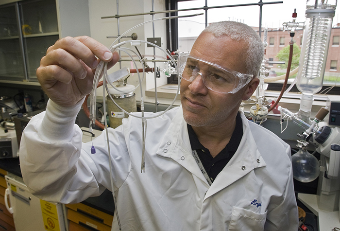 Dr. Bryant, NASA inventor, in the lab