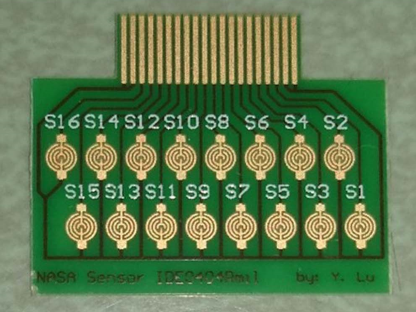  A printed circuit board (PCB) chip, crafted from functionalized single-walled carbon nanotubes (SWCNTs) and gold nanoparticles (AuNPs) Image Credit: NASA